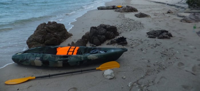 A couple of kayaks on the beach near Samui Naval Base.